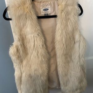 White fur vest